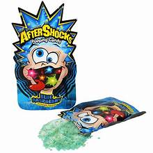 AfterShocks Blue Raspberry popping candy crystals spilling from pack