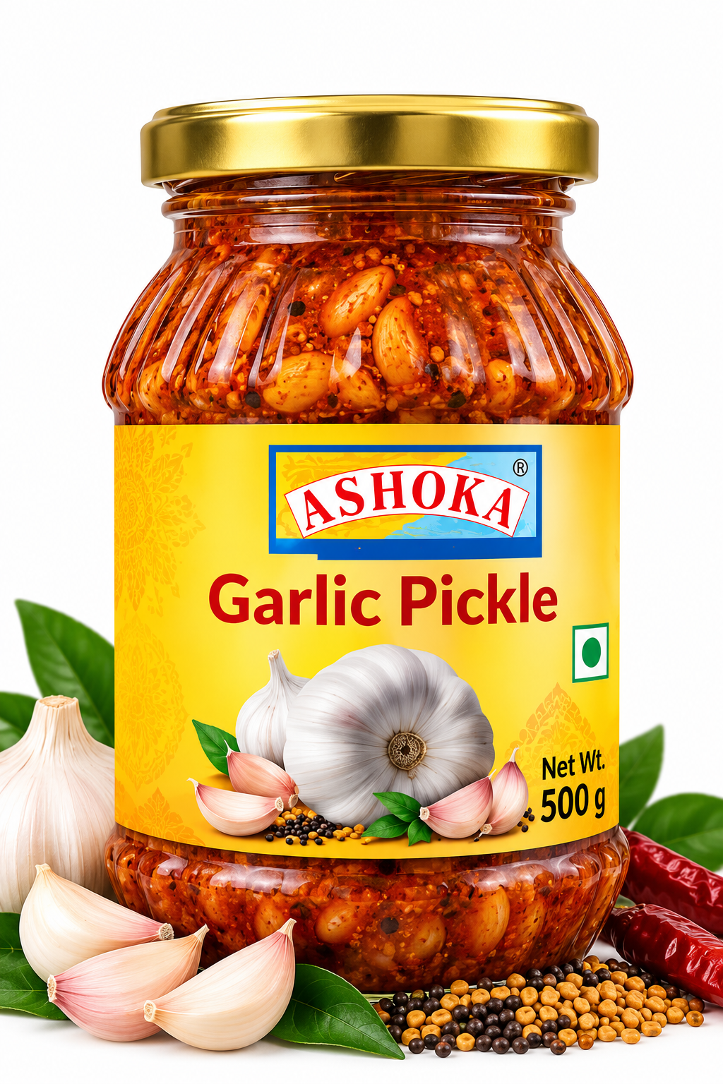 Ashoka Garlic Pickle 500g featuring a glass jar with a gold lid and bright yellow label, filled with traditional spicy garlic pickle, alongside fresh garlic bulbs, peeled garlic cloves, green leaves, mustard seeds, dried red chillies, and aromatic Indian spices.