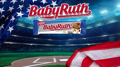 Unwrapped Baby Ruth Bar revealing chocolate, caramel, nougat, and peanut layers.