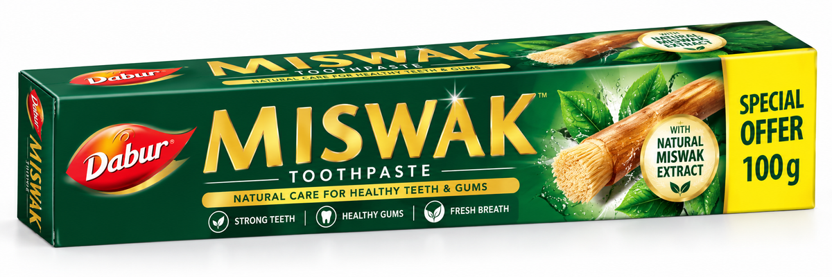 Dabur Miswak Toothpaste 100g in dark green and yellow packaging, featuring natural miswak sticks, green leaves and oral care benefits.
