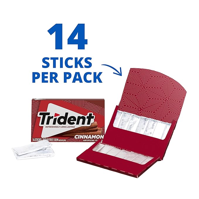 Trident Cinnamon gum next to a notebook for on-the-go freshness