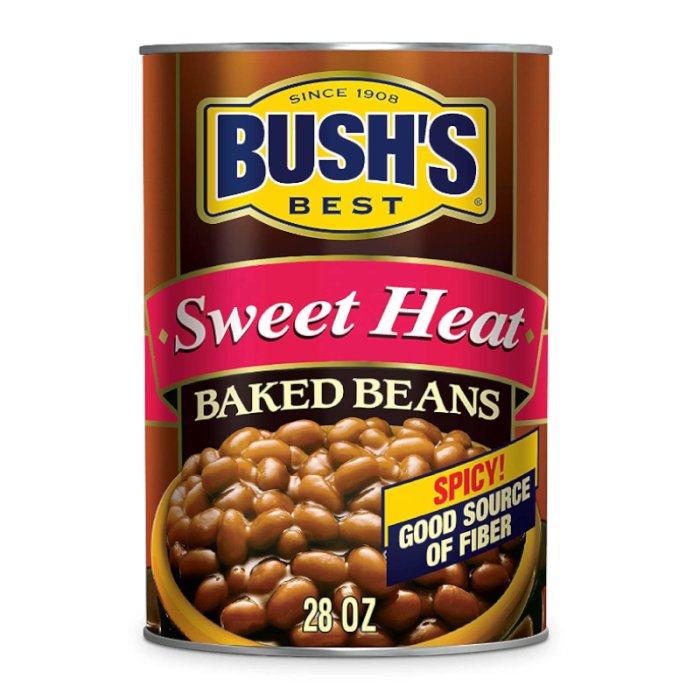 28 oz can of Bush’s Best Sweet Heat Baked Beans with bold red and orange label showing beans in sweet-spicy sauce.