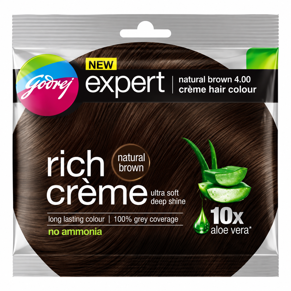 Godrej Expert Rich Crème Natural Brown Hair Colour 20g sachet with black and silver packaging, glossy brown hair graphics, green aloe vera illustrations and Godrej Expert branding.Godrej Expert Rich Crème Natural Brown Hair Colour 20g sachet with black and silver packaging, glossy brown hair graphics, green aloe vera illustrations and Godrej Expert branding.