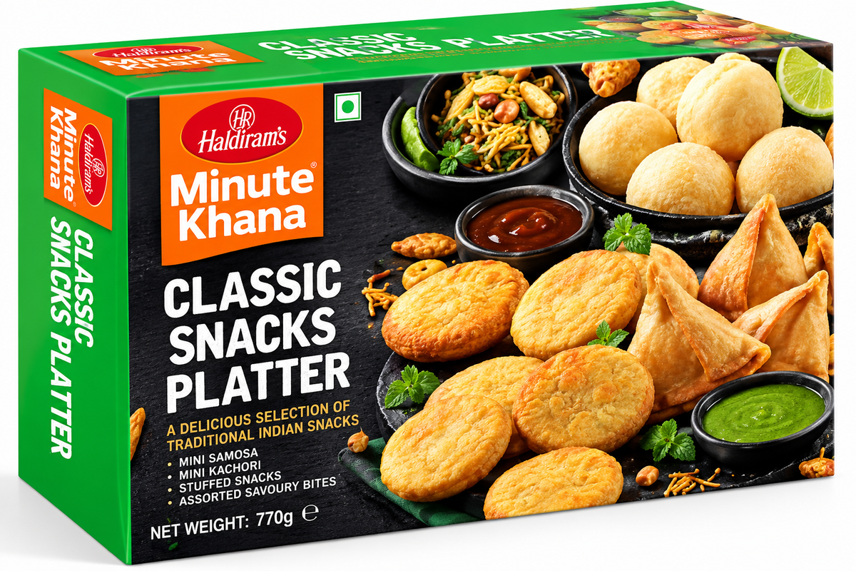 Haldiram’s Minute Khana Classic Snacks Platter 770g box featuring green, orange and black packaging, golden mini samosas, crispy kachoris, assorted Indian savoury snacks, red and green chutneys, and Haldiram’s branding.