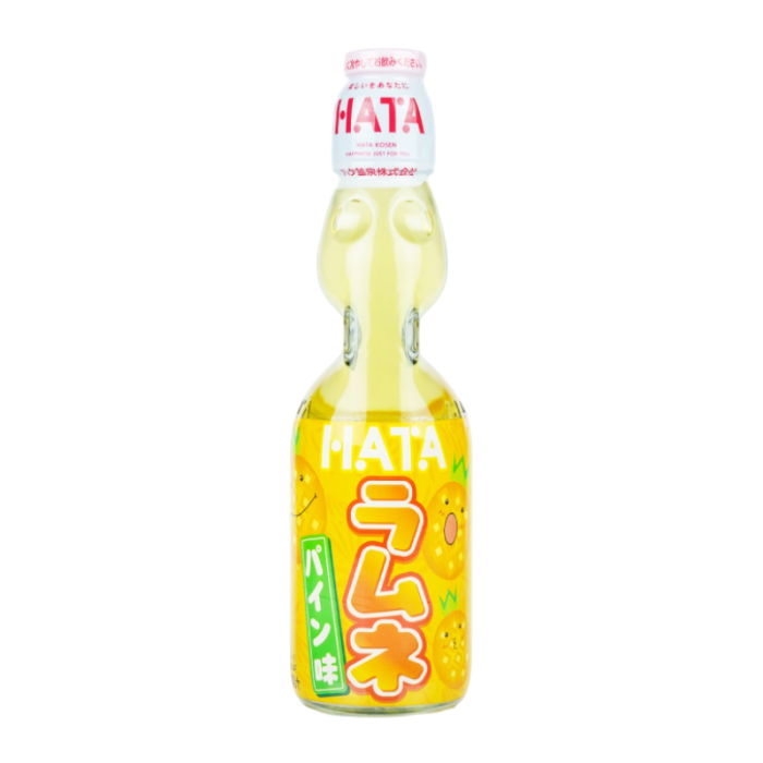 Hata Ramune Pineapple in a 200ml glass bottle, offering a sweet and fizzy pineapple flavor with the signature marble in the bottle neck for a refreshing tropical drink.