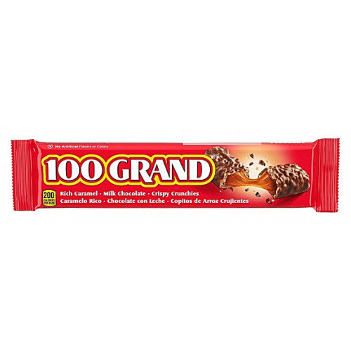 100 Grand Bar cut in half showing layers of milk chocolate, caramel, and crispy rice.
