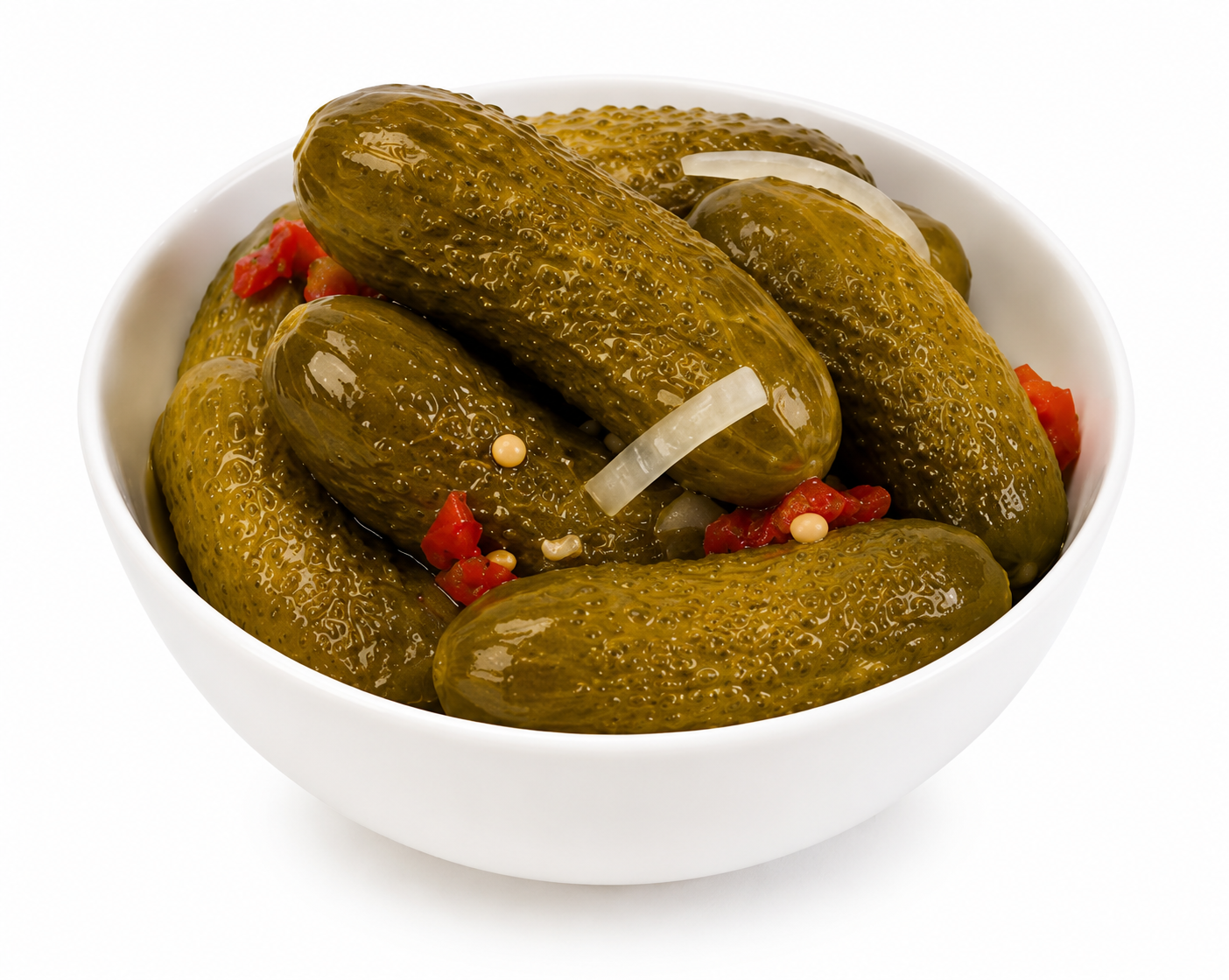 Close-up of pickled gherkins in a white bowl with red pepper, onion and mustard seeds on a white background
