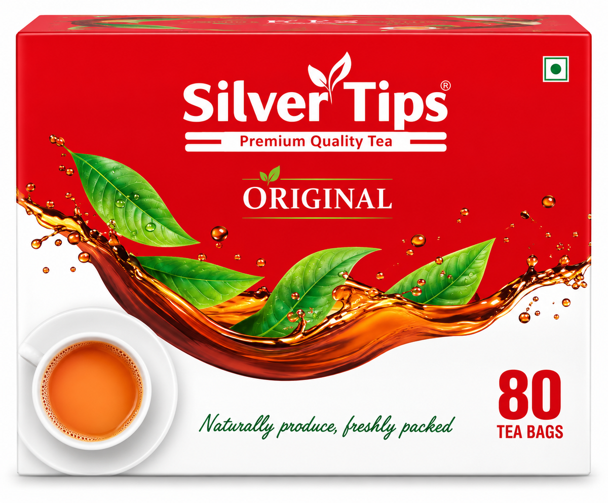SilverTips Original Tea Bags 80-count pack featuring bright red and white packaging, the SilverTips Premium Quality Tea logo, and an “Original” label. The front design shows fresh green tea leaves, a flowing amber tea splash, and a cup of brewed tea. A convenient pack of 80 tea bags for preparing and enjoying tea at home or work.
