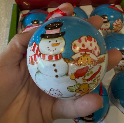 Nostalgic Strawberry Shortcake holiday ornament featuring festive berry details, perfect for Christmas trees or holiday décor.