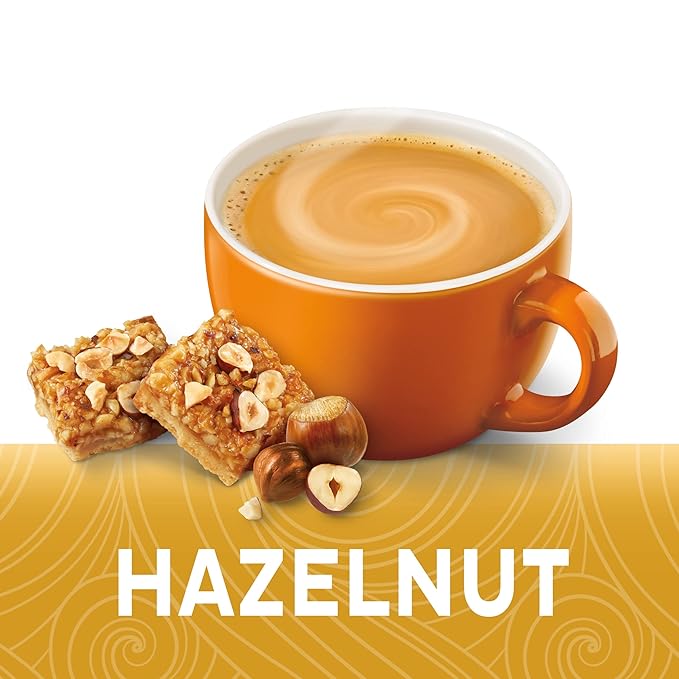 Coffee-Mate Hazelnut Powdered Creamer with creamy hazelnut imagery and branded packaging