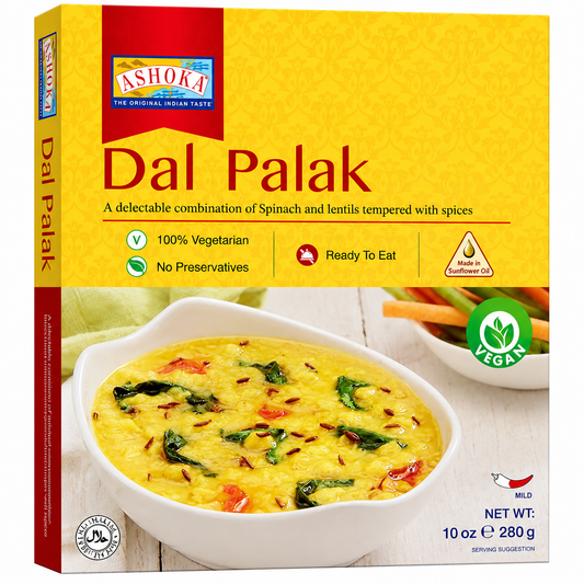 Ashok Dal Palak lentil and spinach curry in a white bowl, shown on its yellow retail packaging box with red side panels and a white background.