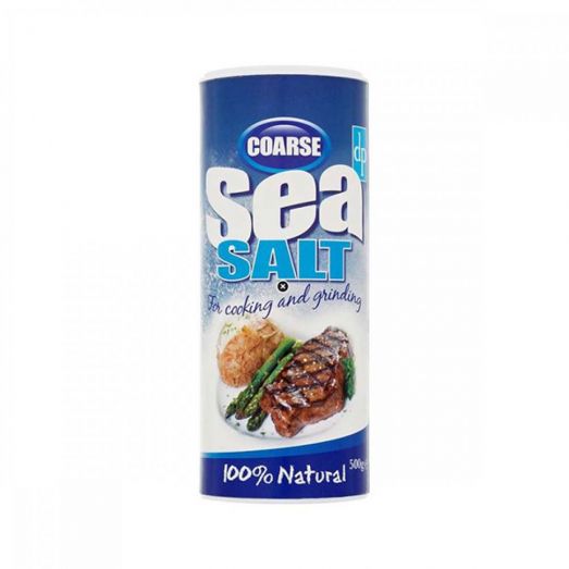 Front-facing image of Dri-Pak Coarse Sea Salt 500g cylindrical container with blue and white label, featuring large “Sea Salt” text, “For cooking and grinding,” and “100% Natural” wording, along with an image of grilled steak, asparagus, and baked potato on the packaging.