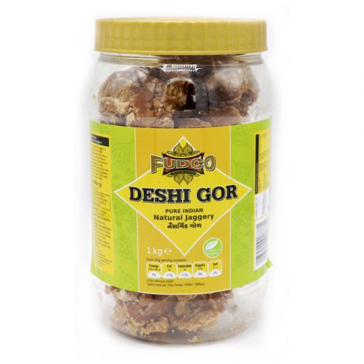 Fudco Deshi Gor 1kg natural jaggery block with golden-brown colour, traditional Indian cane sweetener for cooking and beverages.