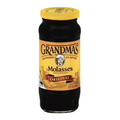 A 355g bottle of Grandma’s Molasses with dark, rich syrup inside, ideal for baking cookies, cakes, and savory dishes.