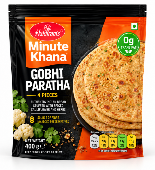 Haldiram’s Minute Khana Coriander Kulcha 240g pack featuring golden kulchas topped with fresh coriander leaves in black and orange packaging.