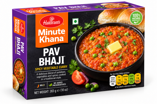 Haldiram’s Minute Khana Pav Bhaji 283g pack featuring spicy vegetable curry topped with butter and coriander, served with soft pav buns in purple, black and orange packaging.