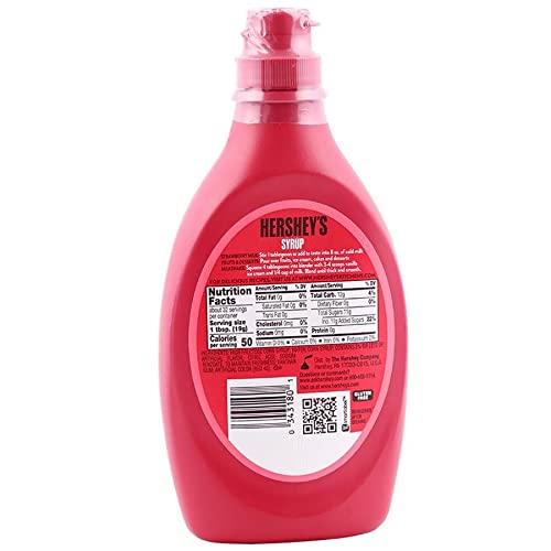 Bottle of Hershey's Strawberry Syrup next to a bowl of vanilla ice cream, perfect for drizzling over desserts.