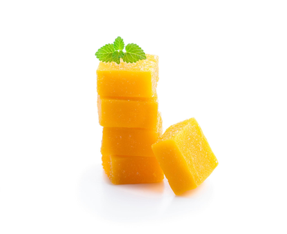 Prepared mango flavored gelatin in clear dessert bowl.