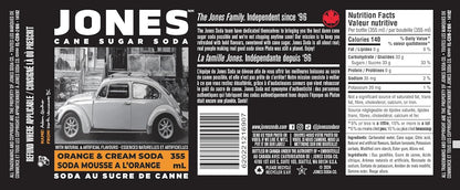 Close-up of a Jones Soda Orange & Cream 355ml bottle showing the vivid orange color of the soda through clear glass, emphasizing the creamy orange flavor and classic soda-shop aesthetic.