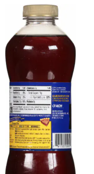 455 g bottle of Karo Dark Corn Syrup – versatile sweetener for desserts and cooking.