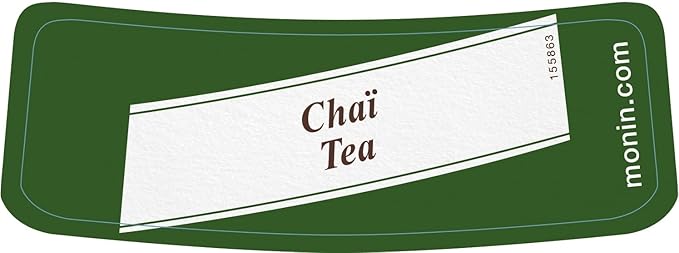 Monin Premium Chai Tea Concentrate bottle, 700ml, showcasing natural spices and rich flavor for chai lattes, iced drinks, and cocktails. Vegan-friendly and allergen-free.