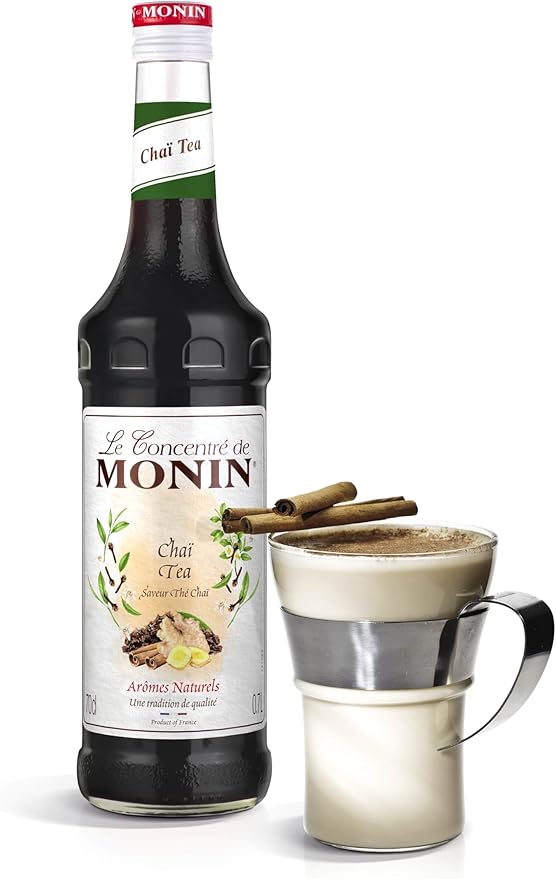 Monin Premium Chai Tea Concentrate bottle, 700ml, showcasing natural spices and rich flavor for chai lattes, iced drinks, and cocktails. Vegan-friendly and allergen-free.