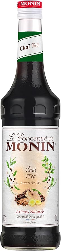 Monin Premium Chai Tea Concentrate bottle, 700ml, showcasing natural spices and rich flavor for chai lattes, iced drinks, and cocktails. Vegan-friendly and allergen-free.