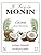 700ml MONIN Premium Coconut Syrup in glass bottle with natural flavours, ideal for beverages and desserts.