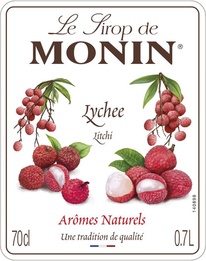 A Monin Lychee syrup label or packaging panel with illustrations of lychee fruits and branches. The brand name 'Le Sirop de MONIN' appears at the top, with 'Lychee' and 'Litchi' in the center, and 'Arômes Naturels' near the bottom on a white background.