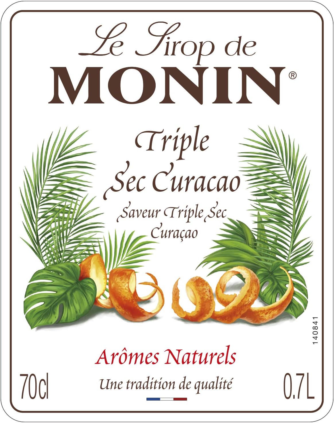 Close-up of the MONIN Triple Sec Curaçao Orange Syrup 700ml label featuring natural orange and citrus flavouring with premium French quality.