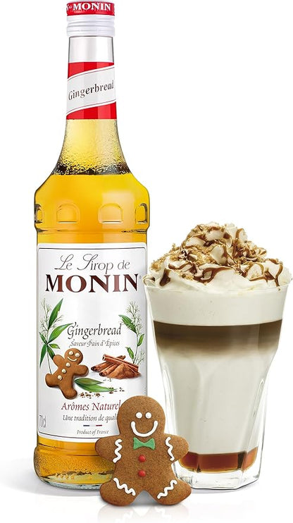 Monin Premium Gingerbread Syrup 700ml bottle with a festive label, featuring a rich gingerbread flavor perfect for coffee, cocktails, and desserts. Vegan-friendly and allergen-free.