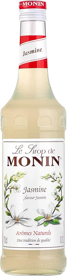 Monin Premium Jasmine Syrup 700ml bottle with a floral design, offering a delicate jasmine flavor perfect for cocktails, mocktails, teas, and desserts. Vegan-friendly and allergen-free.