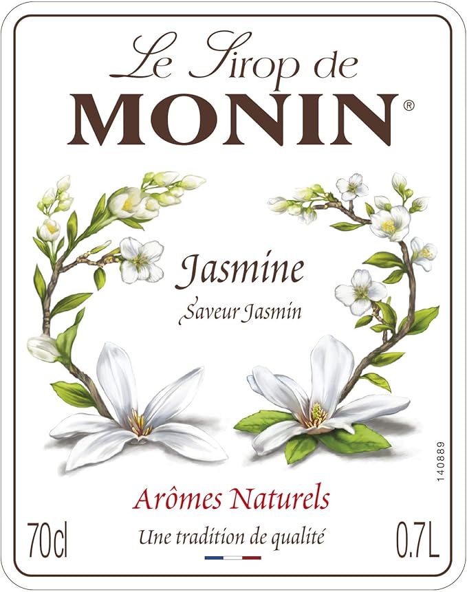 Monin Premium Jasmine Syrup 700ml bottle with a floral design, offering a delicate jasmine flavor perfect for cocktails, mocktails, teas, and desserts. Vegan-friendly and allergen-free.