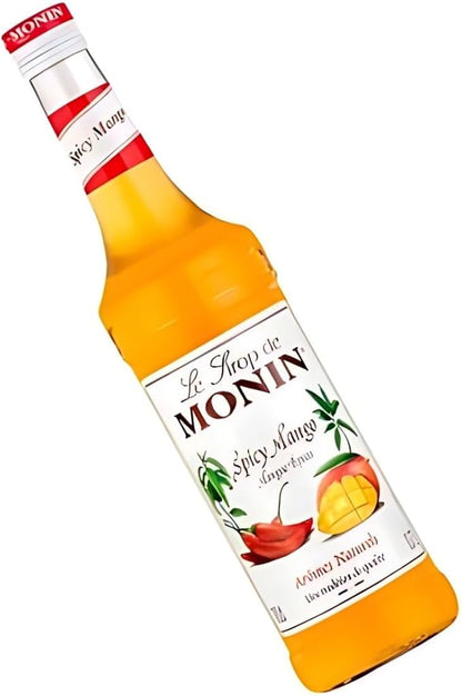 Monin Premium Mango Syrup 700ml bottle featuring sweet, tropical mango flavor. Ideal for cocktails, mocktails, iced teas, smoothies, and desserts. Vegan, allergen-free, and made with 100% natural ingredients.