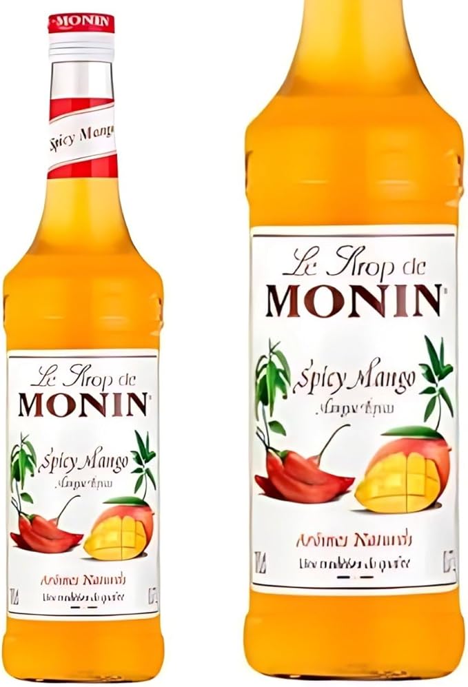 Monin Premium Mango Syrup 700ml bottle featuring sweet, tropical mango flavor. Ideal for cocktails, mocktails, iced teas, smoothies, and desserts. Vegan, allergen-free, and made with 100% natural ingredients.