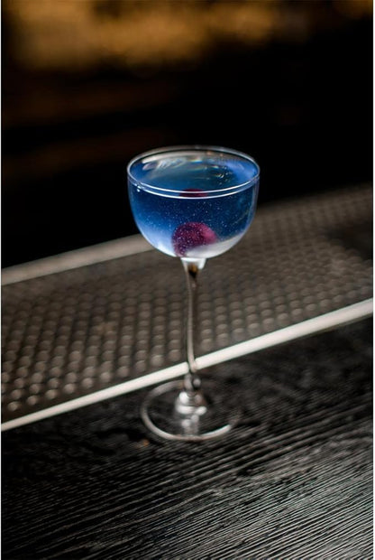 MONIN Premium Muscovado Sugar Syrup 700 ml glass bottle with clear label on white background