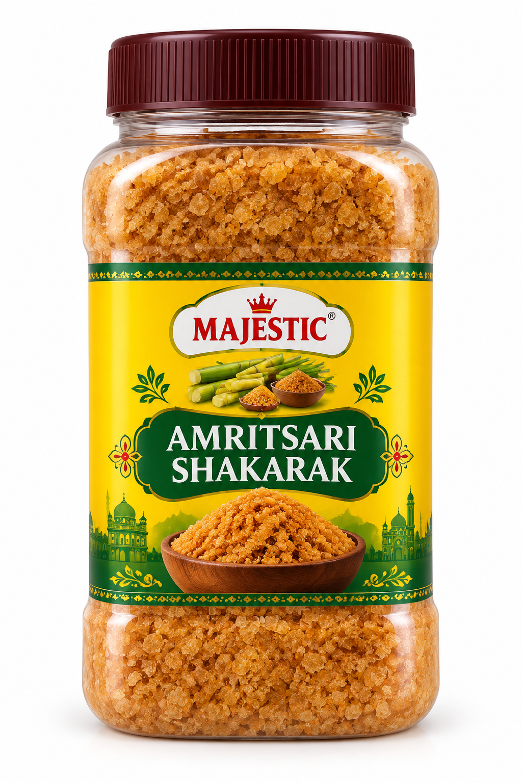 Majestic Amritsari Shakarak 1kg jar featuring a transparent container filled with golden-brown sugar crystals, a maroon screw lid, and a green and yellow label with traditional Indian decorative patterns.