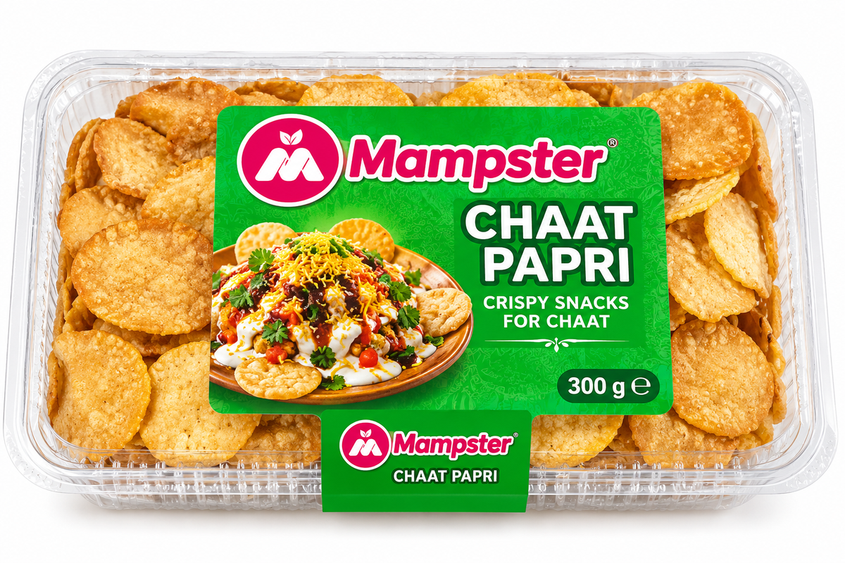 Mampster Chaat Papri Crispy 300g pack featuring golden crispy papri crackers in a transparent plastic tray with a green Mampster label and a chaat serving illustration.