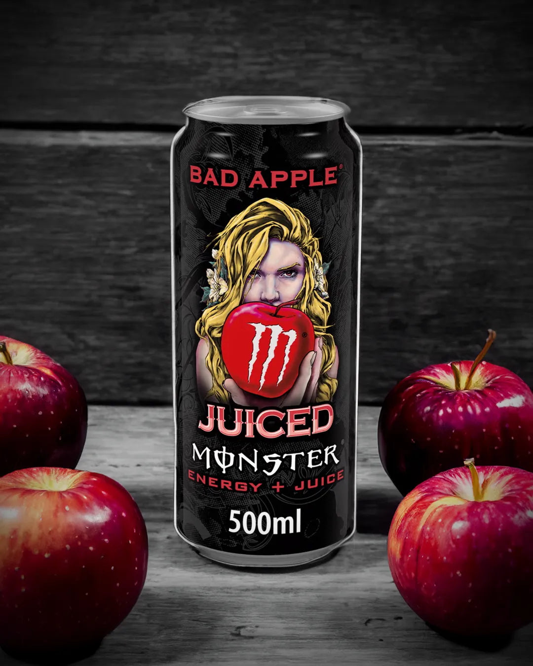 Monster Juiced Bad Apple 500ml can, featuring a crisp apple design and offering a tangy, sweet apple flavor with an energizing blend of caffeine and B-vitamins.