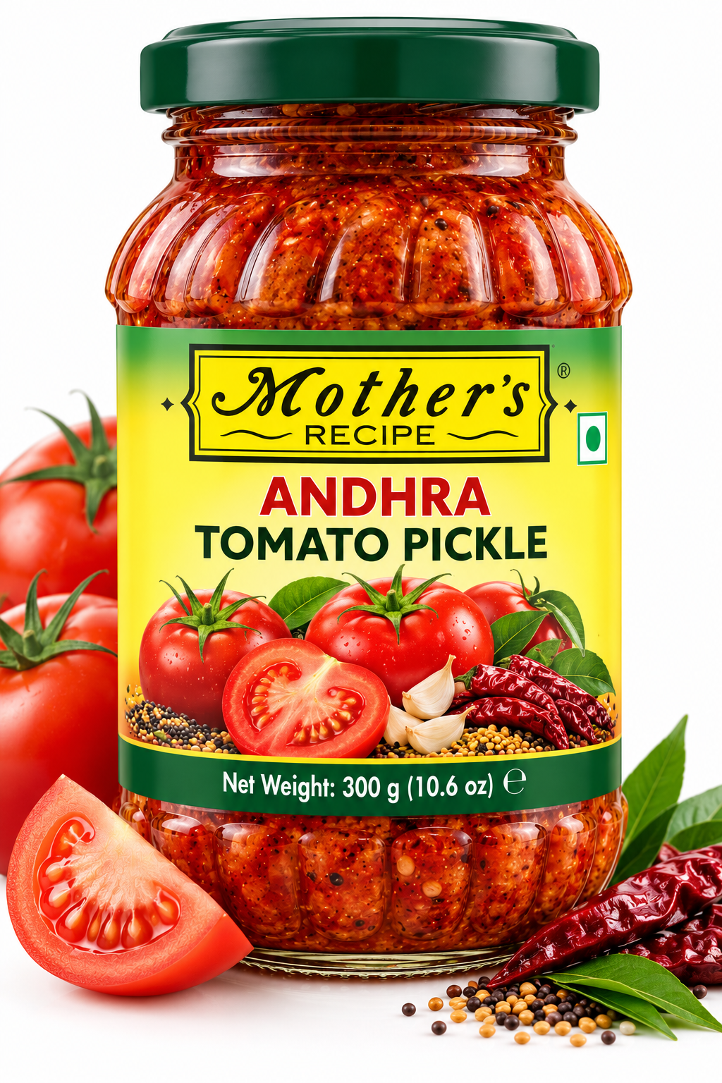 Mother's Recipe Andhra Tomato Pickle 300g featuring a glass jar with a dark green lid and yellow-and-green label, filled with spicy tomato pickle, alongside fresh tomatoes, red chillies, garlic, curry leaves, and mustard seeds.