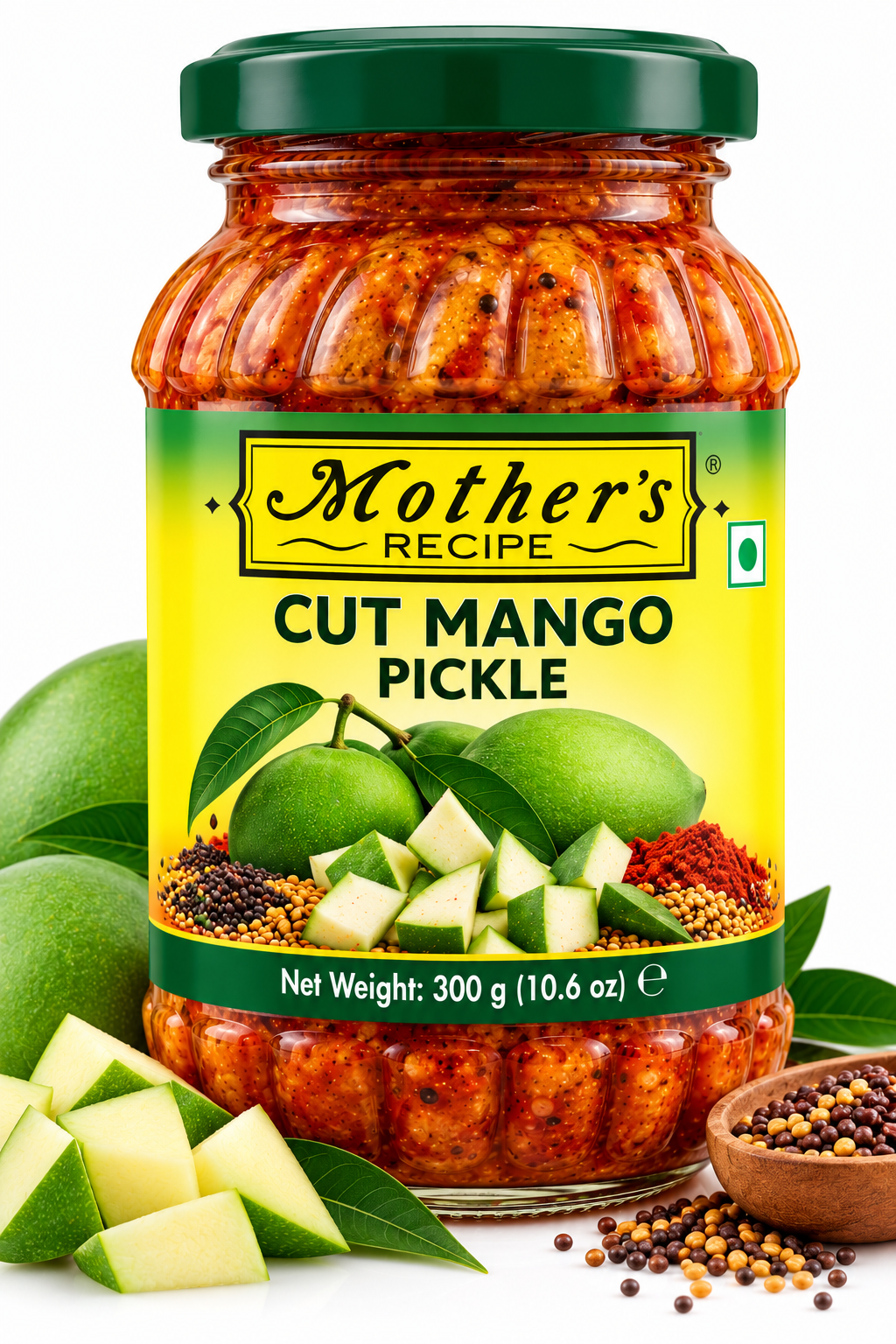 Mother's Recipe Cut Mango Pickle 300g featuring a glass jar with a dark green lid and yellow-and-green label, filled with spicy mango pickle, alongside fresh green mangoes, sliced mango pieces, mustard seeds, and aromatic spices.
