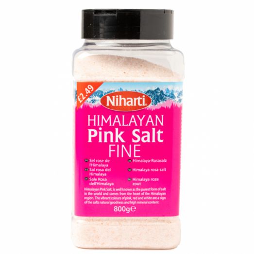 Pack of Niharti Himalayan Pink Salt Fine 800g with delicate pink crystals for cooking, seasoning, and table use.