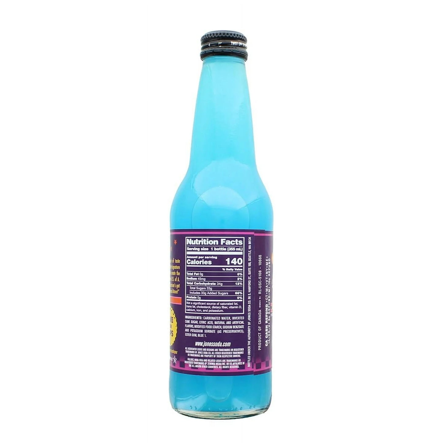 A clear 355ml glass bottle of Jones Soda Special Release Nuka-Cola Quantum containing bright blue soda and a Fallout-themed retro label.