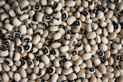 Organic Swaad Black Eye Beans 1kg retail pack containing dried black-eyed beans (cowpeas) in branded packaging.