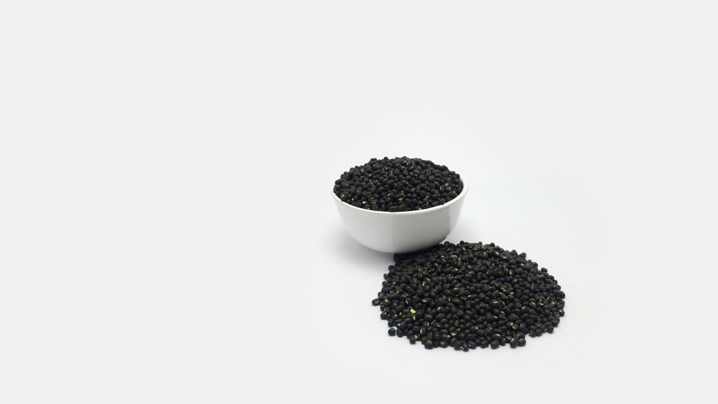 Organic Swaad Urad Black Whole 1kg retail pack showing whole black gram (black urad with skin) in branded packaging.