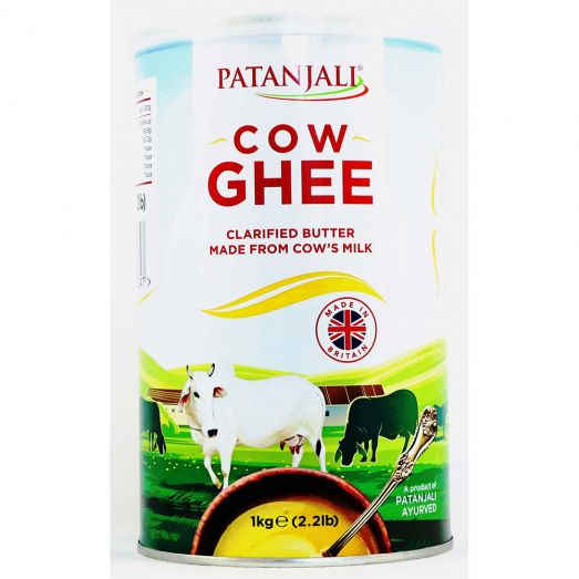 Patanjali Cow Ghee 1kg tin front view showing pure clarified butter made in Britain with branded packaging.