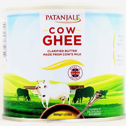Patanjali Cow Ghee 500g tin pure clarified butter made from cow milk ideal for Indian cooking frying and traditional recipes.