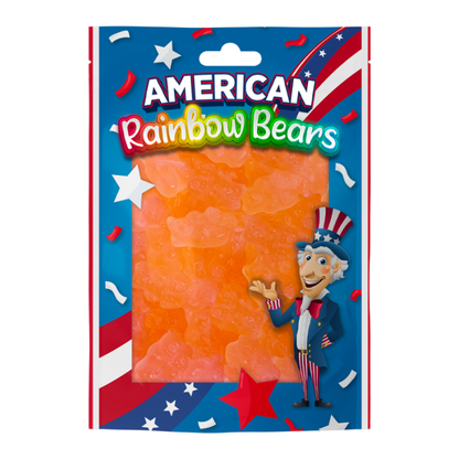 Close-up of American Rainbow pink grapefruit gummy bears showing their soft, chewy texture.