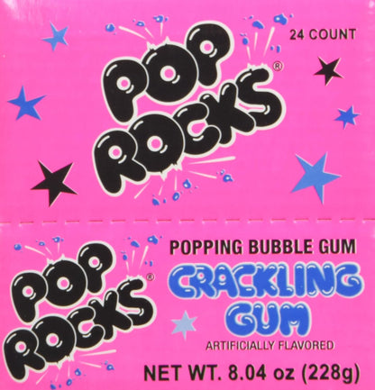 Pop Rocks Bubble Gum sachet displayed on a colorful background with popping candy scattered around.