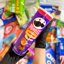 A canister of Pringles Enchilada Adobada flavor, featuring stackable, crispy chips coated with bold, smoky, and tangy adobada seasoning. The packaging showcases the product's vibrant colors and highlights its spicy Mexican-inspired flavor.